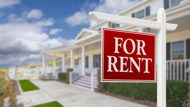 Picture of a For Rent sign outside of a home