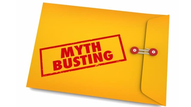 A yellow envelope with a 'Myth Busting' stamp, symbolizing the debunking of common real estate investing myths